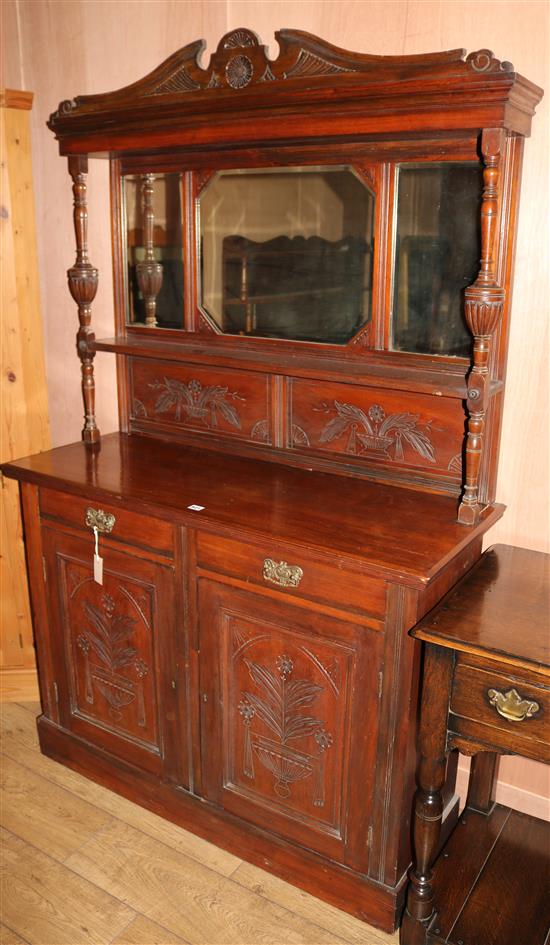 A late Victorian walnut chiffonier, with mirrored back, W.117cm